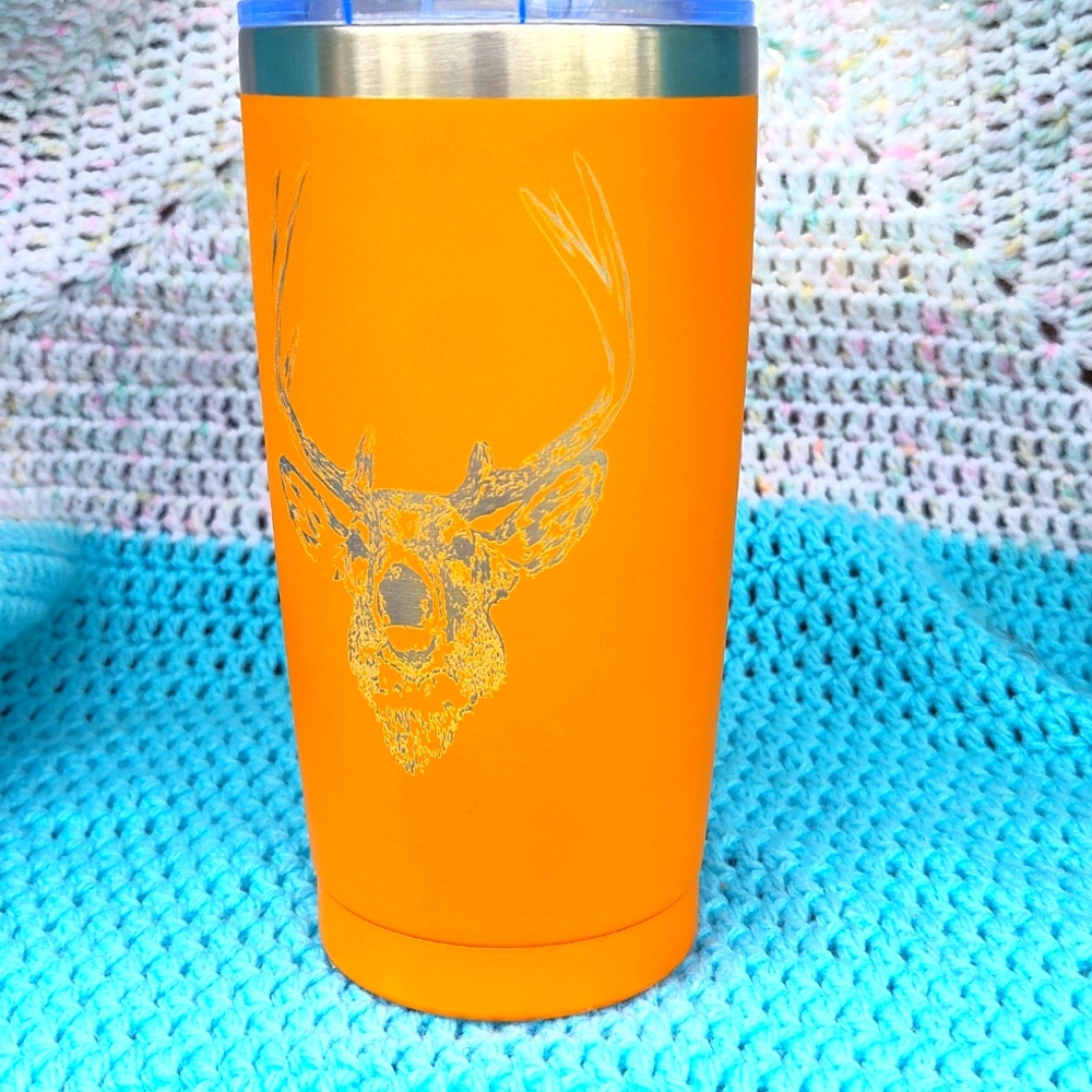 20 oz  tumbler with buck on comes with stainless reusable straw